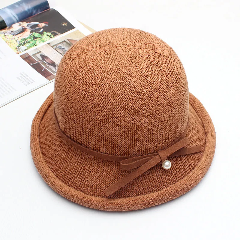 Dome curling pot hat female summer wild Western-style knitted bow pearl sun hat fisherman hat breathable cool hat